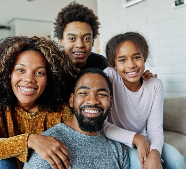 Portrait,Of,A,Happy,Black,Family,Mother,Father,And,Kids